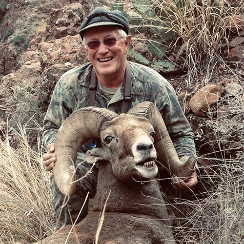 John Harris with a bighorn sheep